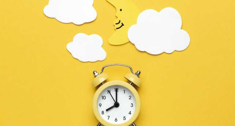yellow background with clock, a moon and some clouds